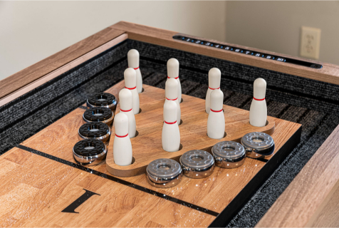 A game of bowling pins and a game board AI-generated content may be incorrect., Picture