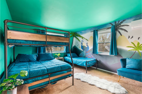 A room with bunk beds and a wall mural AI-generated content may be incorrect., Picture