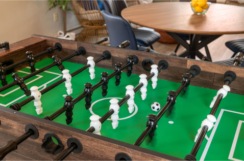 A table with a football ball and a table AI-generated content may be incorrect., Picture21